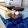 Multiple Tables for Apartment Building | Dining Table in Tables by Doro Designs | Camden Pier District in St. Petersburg. Item composed of wood
