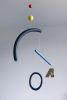 Hola Joan Mobile Sculpture | Wall Sculpture in Wall Hangings by Eli Altanova. Item composed of wood & brass