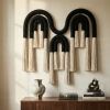 Black & Cream Macrame Wall Hanging, Modern Boho Fiber Art | Wall Hangings by Sarmal Design. Item made of cotton with fiber works with boho & art deco style