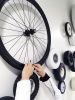 Interactive tires wall - For Argo ai, a self driving vehicle company | Wall Sculpture in Wall Hangings by ANTLRE - Hannah Sitzer | Argo AI in Palo Alto. Item made of metal with synthetic