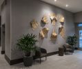 Curls | Wall Sculpture in Wall Hangings by Susannah Mira | AC Hotel by Marriott Beverly Hills in Los Angeles. Item made of wood